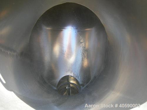 Used Patterson Kelley twin shell blender, 3 cubic foot capacity, 304 stainless steel. 340 pounds per cubic foot max material density. (2) 16" diameter charge ports with quick release covers. Driven b...