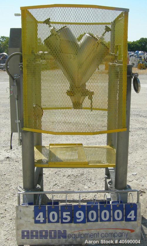 Used Patterson Kelly twin shell cross flow blender, 1 cubic foot capacity, 316 stainless steel. Maximum material density 500 pounds per cubic foot. (2) 10" diameter charge ports with quick release co...