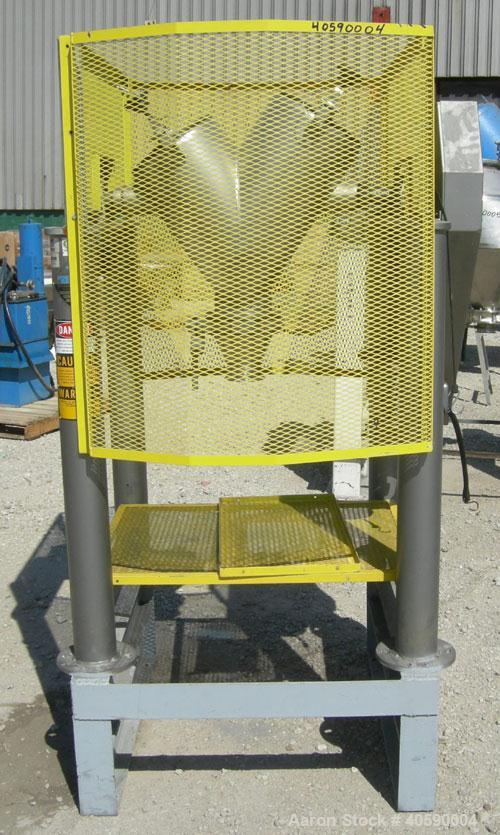 Used Patterson Kelly twin shell cross flow blender, 1 cubic foot capacity, 316 stainless steel. Maximum material density 500 pounds per cubic foot. (2) 10" diameter charge ports with quick release co...