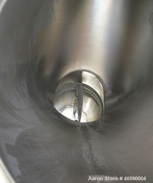 Used Patterson Kelly twin shell cross flow blender, 1 cubic foot capacity, 316 stainless steel. Maximum material density 500 pounds per cubic foot. (2) 10" diameter charge ports with quick release co...
