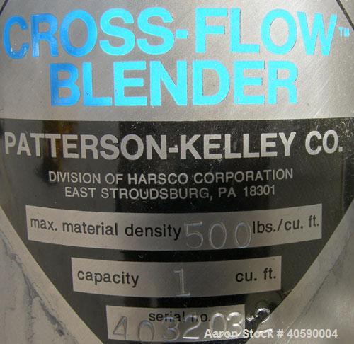 Used Patterson Kelly twin shell cross flow blender, 1 cubic foot capacity, 316 stainless steel. Maximum material density 500 pounds per cubic foot. (2) 10" diameter charge ports with quick release co...