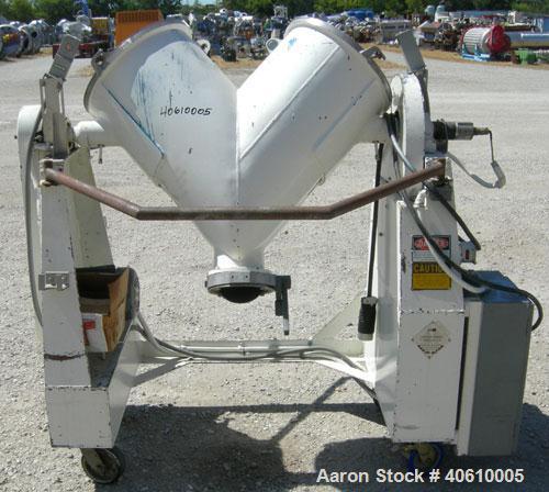 Used Patterson Kelley Twin Shell Liquid Solids Blender, 3 cubic feet capacity, 304 stainless steel. 60 pounds per cubic foot max material density. Liquid solids bar, driven by a 2 hp, 3/60/230/460 vo...
