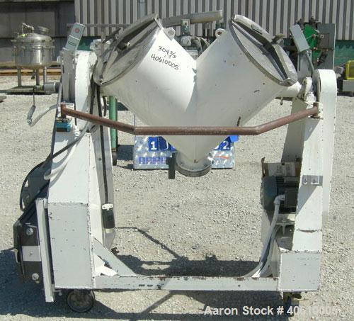 Used Patterson Kelley Twin Shell Liquid Solids Blender, 3 cubic feet capacity, 304 stainless steel. 60 pounds per cubic foot max material density. Liquid solids bar, driven by a 2 hp, 3/60/230/460 vo...