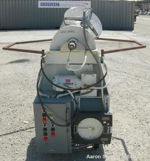 Used Patterson Kelley Twin Shell Liquid Solids Blender, 3 cubic feet capacity, 304 stainless steel. 60 pounds per cubic foot max material density. Liquid solids bar, driven by a 2 hp, 3/60/230/460 vo...