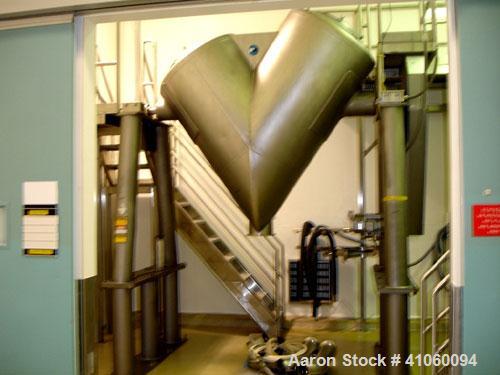 Used Patterson Kelley Twin Shell Crossflow Blender, 50 cubic feet, stainless steel construction. Rated 65 pounds per cubic foot maximum material density. Standard feed ports with covers, 10 outlet wi...