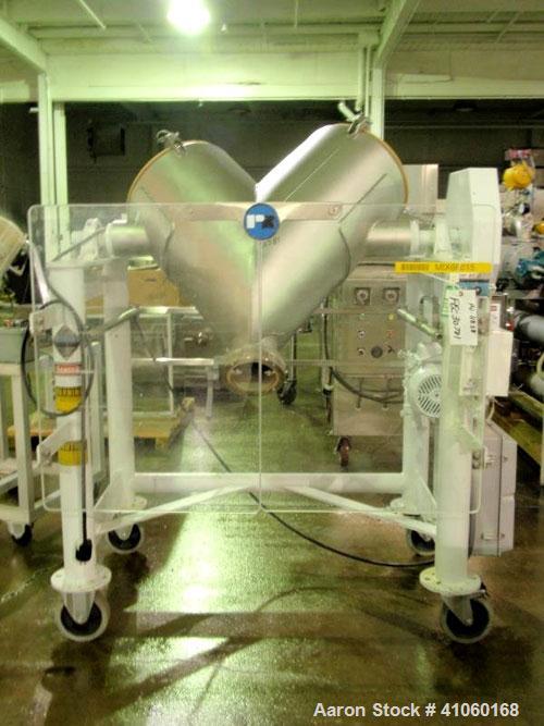 Used Patterson Kelley Twin Shell Cross Flow Blender, 5 cubic feet, stainless steel. Maximum material density 106 pounds per cubic foot. On stand with 1 hp, 230/460 volt motor. Serial #255030.