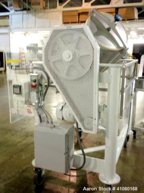 Used Patterson Kelley Twin Shell Cross Flow Blender, 5 cubic feet, stainless steel. Maximum material density 106 pounds per cubic foot. On stand with 1 hp, 230/460 volt motor. Serial #255030.
