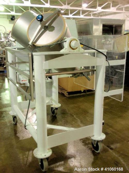 Used Patterson Kelley Twin Shell Cross Flow Blender, 5 cubic feet, stainless steel. Maximum material density 106 pounds per cubic foot. On stand with 1 hp, 230/460 volt motor. Serial #255030.