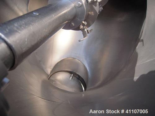 Used Patterson Kelley Twin Shell Blender, 3 Cubic Foot Capacity, 304 Stainless Steel.  Maximum material density 60 pounds a cubic foot. (2) 16" diameter charge ports with quick release covers. Shell ...