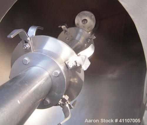 Used Patterson Kelley Twin Shell Blender, 3 Cubic Foot Capacity, 304 Stainless Steel.  Maximum material density 60 pounds a cubic foot. (2) 16" diameter charge ports with quick release covers. Shell ...