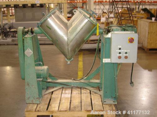 Used Patterson-Kelley Twin Shell Dry Blender, 2 Cubic Feet Capacity, Stainless Steel. Maximum material density 195 pounds per cubic foot. 14" diameter cones with quick release covers. Shell driven by...
