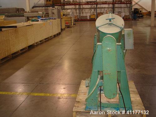 Used Patterson-Kelley Twin Shell Dry Blender, 2 Cubic Feet Capacity, Stainless Steel. Maximum material density 195 pounds per cubic foot. 14" diameter cones with quick release covers. Shell driven by...