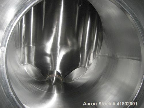 Used Patterson Kelley Twin Shell Dry Blender, 30 Cubic Feet Capacity, Stainless Steel. Approximately 36" diameter cones, (2) 17" diameter openings. Polished internal. Shell driven by a 5 hp, 3/60/230...