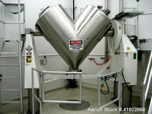 Used Patterson Kelley Twin Shell Dry Blender, 30 cubic foot capacity, stainless steel. Maximum material density 55 pounds per cubic foot. Approximately 36" diameter cones, (2) 17" diameter openings. ...