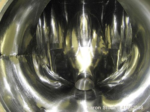 Used Patterson Kelley Twin Shell Dry Blender, 30 cubic foot capacity, stainless steel. Maximum material density 55 pounds per cubic foot. Approximately 36" diameter cones, (2) 17" diameter openings. ...