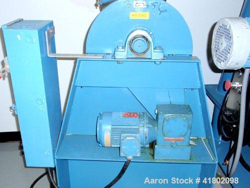 Used Patterson Kelly Twin Shell Blender, 1 cubic foot capacity, stainless steel. Maximum material density 500 pounds per cubic foot. (2) 10" diameter charge ports with quick release covers. Shell dri...