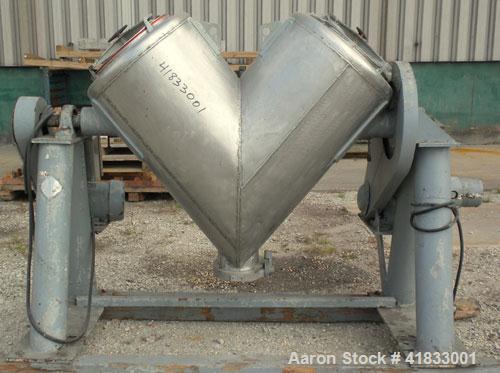 Used Patterson Kelley Twin Shell Liquid Solids Blender, 10 Cubic Feet Capacity, 304 Stainless Steel. 70 pounds a cubic foot maximum material density. 25’’ diameter cones. 316 stainless steel intensif...