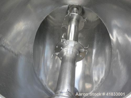 Used Patterson Kelley Twin Shell Liquid Solids Blender, 10 Cubic Feet Capacity, 304 Stainless Steel. 70 pounds a cubic foot maximum material density. 25’’ diameter cones. 316 stainless steel intensif...