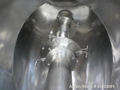 Used Patterson Kelley Twin Shell Liquid Solids Blender, 10 Cubic Feet Capacity, 304 Stainless Steel. 70 pounds a cubic foot maximum material density. 25’’ diameter cones. 316 stainless steel intensif...