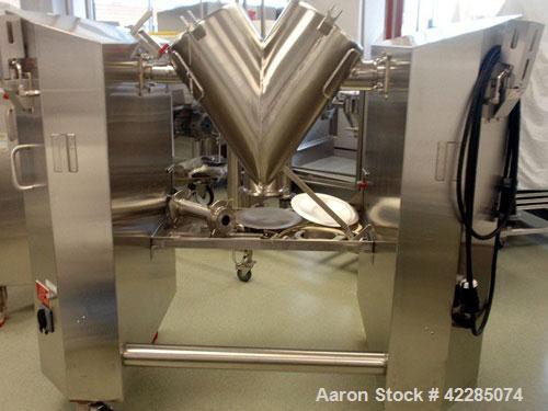 Used Patterson Kelley Twin Shell Blender, 2 Cubic Foot. Stainless steel construction, rated 325 lbs/cu. ft. max material density, standard access ports with covers, with 2 HP 575 volt shell drive, 5 ...