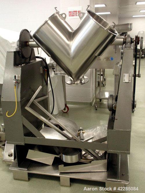 Used Patterson Kelley Twin Shell Blender, 2 Cubic Foot. Stainless steel construction, rated 195 lbs/cu. ft. max material density, standard access ports with covers, with 3/4 HP 230/460 volt shell dri...