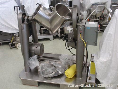 Used Patterson Kelley Twin Shell Blender, 1 Cubic Foot. Stainless steel construction, rated 60 lbs/cu. ft. max material density, standard access ports with covers, 3/4 HP 550 volt shell drive, 2 HP 5...