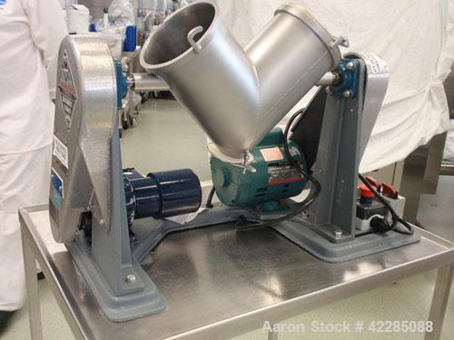 Used Patterson Kelley Twin Shell Blender, 4 Quart. Stainless steel construction. 150 lbs/cu. ft. max material density. Standard access ports with covers, pin bar driven by a 1/4 HP 115/230 volt, shel...
