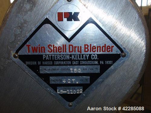 Used Patterson Kelley Twin Shell Blender, 4 Quart. Stainless steel construction. 150 lbs/cu. ft. max material density. Standard access ports with covers, pin bar driven by a 1/4 HP 115/230 volt, shel...