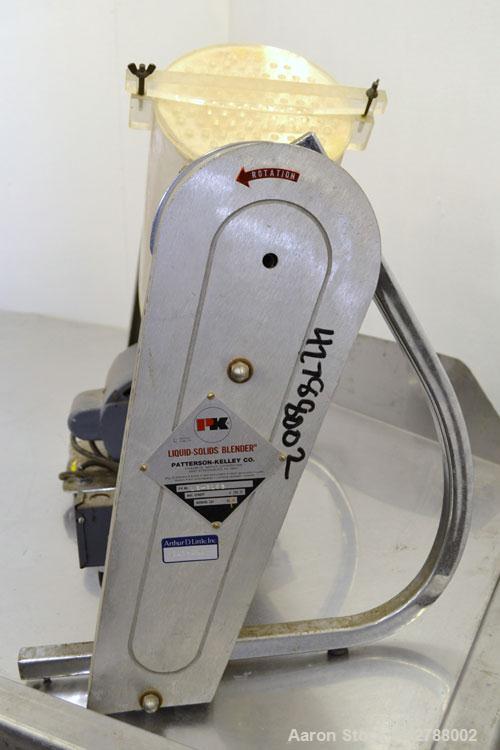 Used Patterson-Kelley Twin Shell Liquid Solids Blender, (0.26) Cubic Feet Capacity (8 Quart). Plexiglass shell with (2) 7-1/2" diameter charge ports with covers. (1) Liquid-solids bar. Shell driven b...