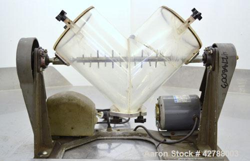 Used Patterson-Kelley Twin Shell Liquid Solids Blender, (0.26) Cubic Feet Capacity (8 Quart). Plexiglass shell with (2) 7-1/2" diameter charge ports with covers. (1) Intensifier bar. Shell driven by ...
