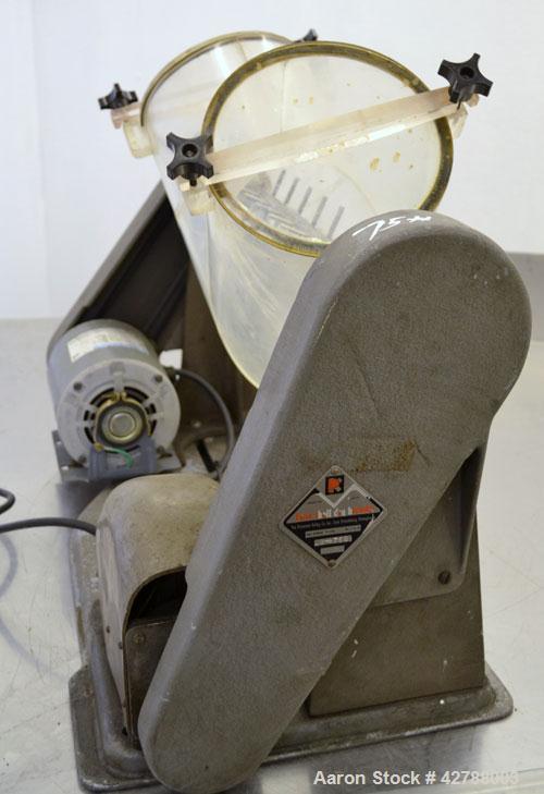 Used Patterson-Kelley Twin Shell Liquid Solids Blender, (0.26) Cubic Feet Capacity (8 Quart). Plexiglass shell with (2) 7-1/2" diameter charge ports with covers. (1) Intensifier bar. Shell driven by ...