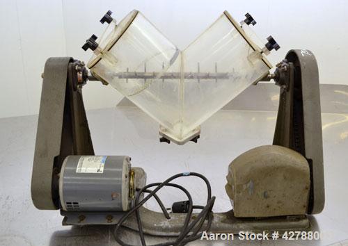 Used Patterson-Kelley Twin Shell Liquid Solids Blender, (0.26) Cubic Feet Capacity (8 Quart). Plexiglass shell with (2) 7-1/2" diameter charge ports with covers. (1) Intensifier bar. Shell driven by ...
