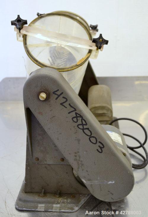Used Patterson-Kelley Twin Shell Liquid Solids Blender, (0.26) Cubic Feet Capacity (8 Quart). Plexiglass shell with (2) 7-1/2" diameter charge ports with covers. (1) Intensifier bar. Shell driven by ...