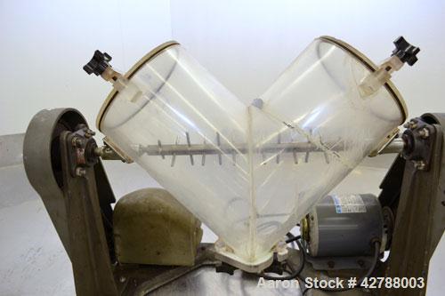 Used Patterson-Kelley Twin Shell Liquid Solids Blender, (0.26) Cubic Feet Capacity (8 Quart). Plexiglass shell with (2) 7-1/2" diameter charge ports with covers. (1) Intensifier bar. Shell driven by ...