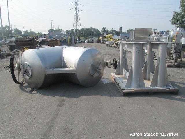 Used Patterson-Kelley 75 Cubic Feet Twin Shell Blender. Stainless steel construction, rated for 50 pounds a cubic foot maximum material density, provision for high speed bar less bar and internals dr...