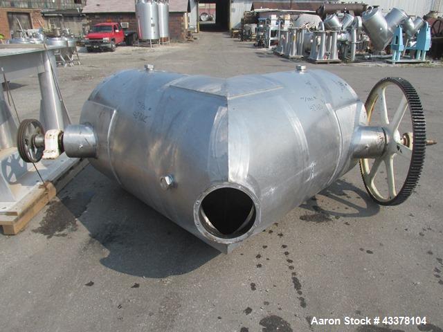 Used Patterson-Kelley 75 Cubic Feet Twin Shell Blender. Stainless steel construction, rated for 50 pounds a cubic foot maximum material density, provision for high speed bar less bar and internals dr...