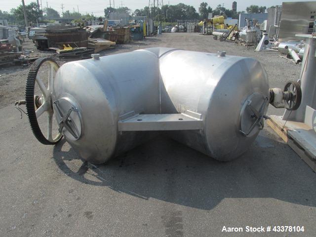 Used Patterson-Kelley 75 Cubic Feet Twin Shell Blender. Stainless steel construction, rated for 50 pounds a cubic foot maximum material density, provision for high speed bar less bar and internals dr...