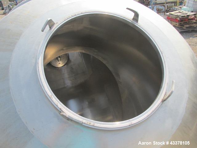 Used Patterson-Kelley 50 Cubic Feet Twin Shell Blender. Stainless steel construction, rated for 50 pounds per cubic foot maximum material density, 5 hp variable speed shell motor drive, provision for...