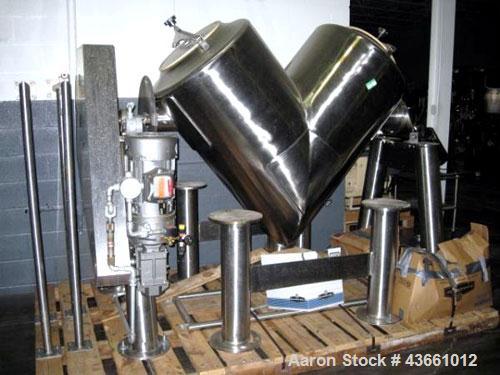 Used Patterson Kelley Twin Shell Blender, 20 Cubic Feet. Stainless steel construciton, rated 70#/ cu. ft. maximum material density, 5 hp, 230/460 volt xp main drive, standard feed ports with covers, ...