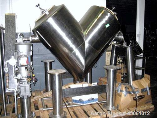 Used Patterson Kelley Twin Shell Blender, 20 Cubic Feet. Stainless steel construciton, rated 70#/ cu. ft. maximum material density, 5 hp, 230/460 volt xp main drive, standard feed ports with covers, ...
