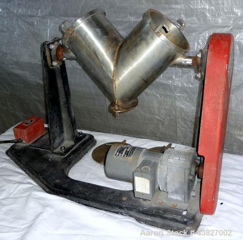 Used Patterson Kelley Twin Shell Dry Blender, 4 Quart Capacity (0.16 Cubic Feet), 304 Stainless Steel. (2) 5-1/2” diameter charge ports with quick release covers. Shells 5-1/2” diameter x 9-1/2” deep...