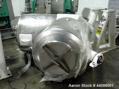 Used Patterson-Kelley Twin Shell Dry Blender, 20 Cubic Feet, Stainless Steel. 55 Pounds a cubic foot maximum material density, standard charge ports with covers, 6" discharge. Approximate 7.5 hp, 230...