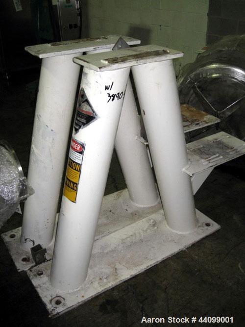 Used Patterson-Kelley Twin Shell Dry Blender, 20 Cubic Feet, Stainless Steel. 55 Pounds a cubic foot maximum material density, standard charge ports with covers, 6" discharge. Approximate 7.5 hp, 230...