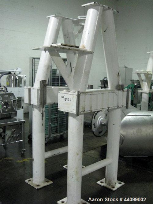 Used Patterson-Kelley Twin Shell Dry Blender, 20 Cubic Feet, Stainless Steel. 65 Pounds a cubic foot maximum material density, standard charge ports with covers, 6" discharge. Approximate 5 hp, 230/4...