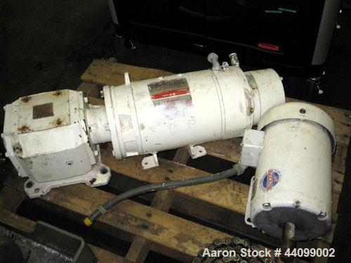 Used Patterson-Kelley Twin Shell Dry Blender, 20 Cubic Feet, Stainless Steel. 65 Pounds a cubic foot maximum material density, standard charge ports with covers, 6" discharge. Approximate 5 hp, 230/4...