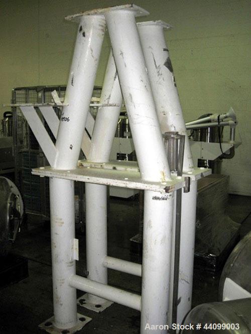 Used Patterson-Kelley Twin Shell Dry Blender, 10 Cubic Feet, Stainless Steel. 90 Pounds a cubic foot maximum material density, standard charge ports with covers, 6" discharge. Approximate 1.5hp, 230/...