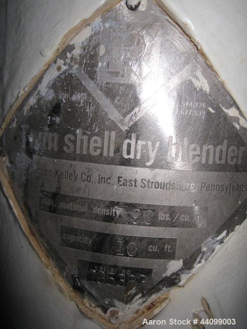 Used Patterson-Kelley Twin Shell Dry Blender, 10 Cubic Feet, Stainless Steel. 90 Pounds a cubic foot maximum material density, standard charge ports with covers, 6" discharge. Approximate 1.5hp, 230/...