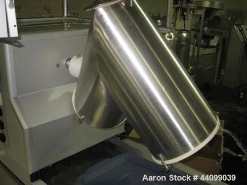 Used Patterson-Kelley Twin Shell Blender, 16 Quart, Stainless Steel. Rated 125/140 pounds a cubic foot maximum material density, with liquid feed bar, plastic enclosure with both shell and bar drives...