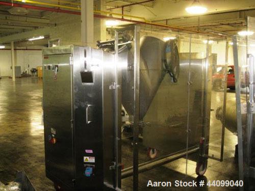 Used Patterson-Kelley Twin Shell Dry Blender, 5 Cubic Feet, Stainless Steel. 70 Pounds a cubic foot maximum material density. Approximate 1hp shell drive, and approximate 3hp, 460 volt bar drive. Ser...