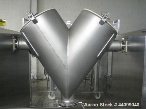 Used Patterson-Kelley Twin Shell Dry Blender, 5 Cubic Feet, Stainless Steel. 70 Pounds a cubic foot maximum material density. Approximate 1hp shell drive, and approximate 3hp, 460 volt bar drive. Ser...